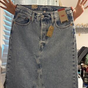 Levi's Women's Light Blue long denim skirt with side slit.